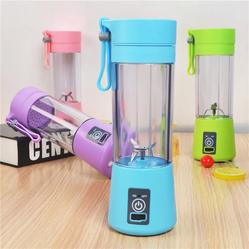 Mini USB electric fruit juicer in pink with stainless steel blade and carry rope