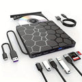 Black USB external CD drive with CD burner measuring 15.5cm by 14.5cm
