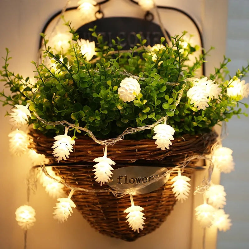 Warm white LED pine cone light string with battery operation for decorative lighting