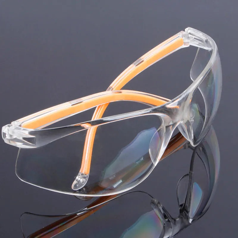Transparent yellow safety goggles made of polycarbonate for eye protection.