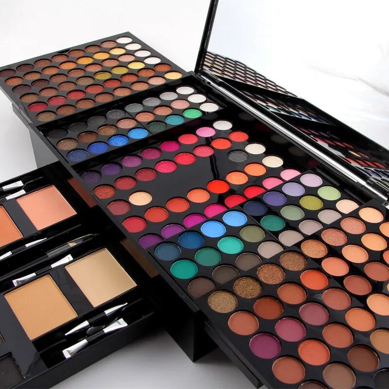 Piano-shaped makeup palette open to show 180 eyeshadow colours, blushes, powders and contour shades