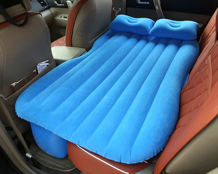 Black wave colour inflatable car bed with two pillows on a car seat
