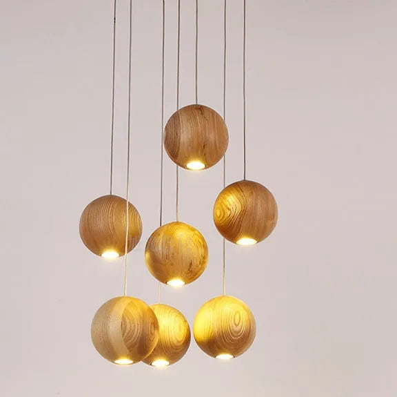 Nordic wood ball chandelier with adjustable height mechanism and solid wood construction for living room lighting