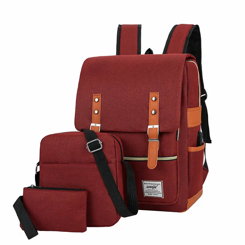 Three-piece business backpack in black with curved shoulder straps, multiple compartments, and waterproof Oxford cloth construction