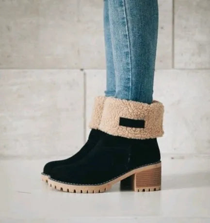 Mid-tube thick heel suede snow boots in black with round toe and low heel, showing wear-resistant soles