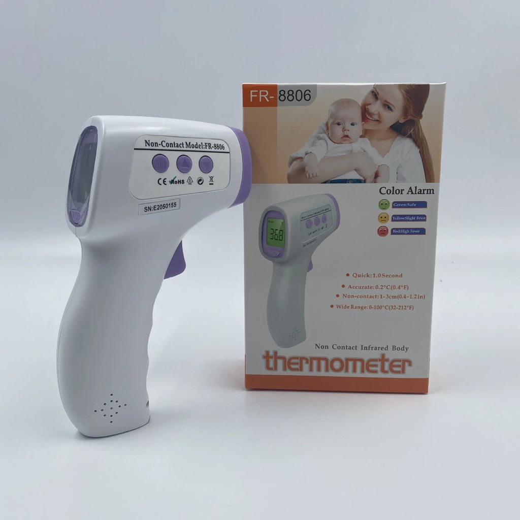 White digital thermometer displaying temperature reading on LCD screen