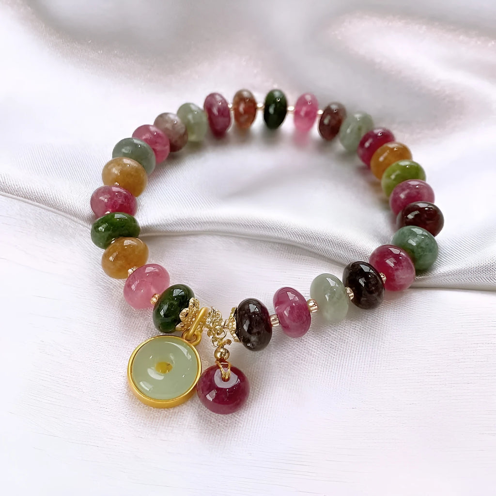 Colourful tourmaline abacus bead bracelet with rabbit pendant on natural stone beads
