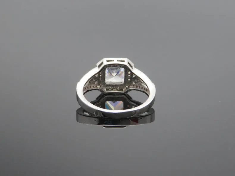 Geometric hollow zircon ring for women in platinum colour with quadrilateral design and inlaid stones