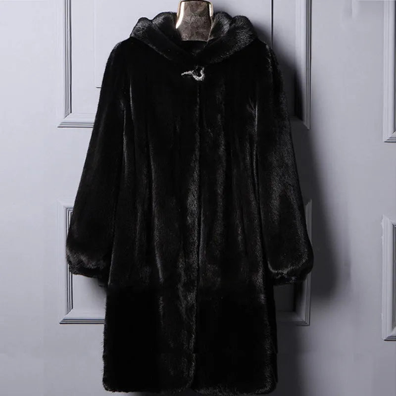 Women's long black hooded faux fur coat for autumn and winter, shown on a hanger.