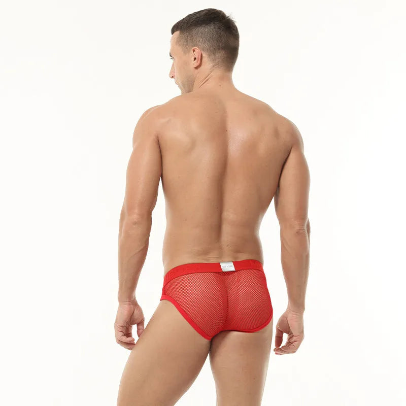 Men's black mesh briefs with low waist design showing elastic fabric texture