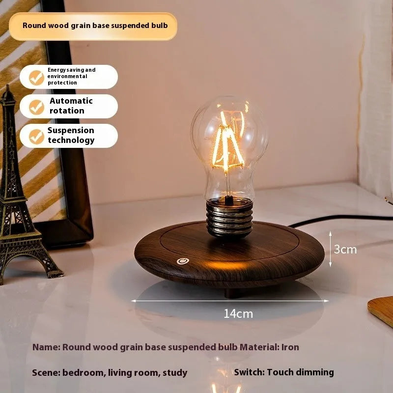 Suspension bulb small night lamp with 11cm square base and iron art body on wooden desk