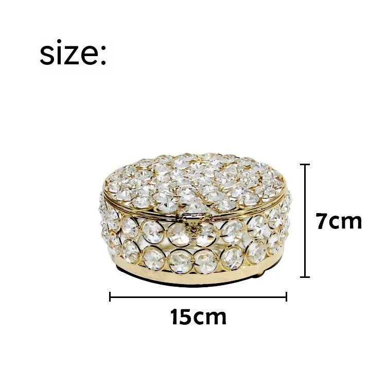 French gold jewellery box with crystal glass lid showing interior, measuring 15cm wide
