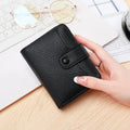Ladies' short wallet with lychee pattern in beige, showing two-fold design and card slots