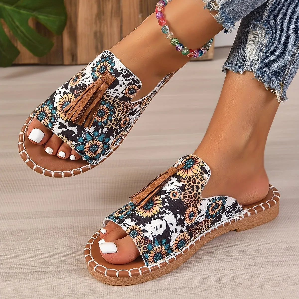 Women's tassel flat sandals in first layer cowhide with fish mouth toe, Roman style, shown in wine red