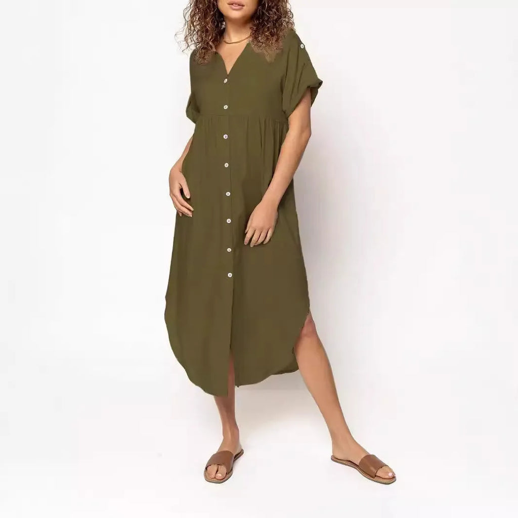Loose-fit mid-length dress with button front in polyester fabric, available in multiple colours and sizes.