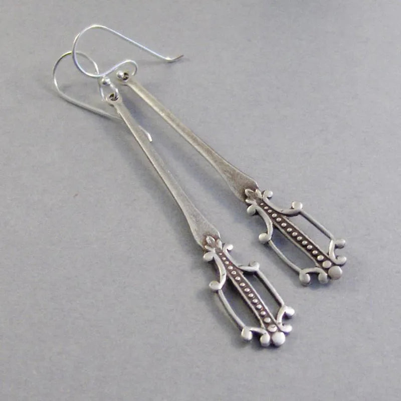 Silver retro geometric alloy earrings for women with electroplated finish, one pair