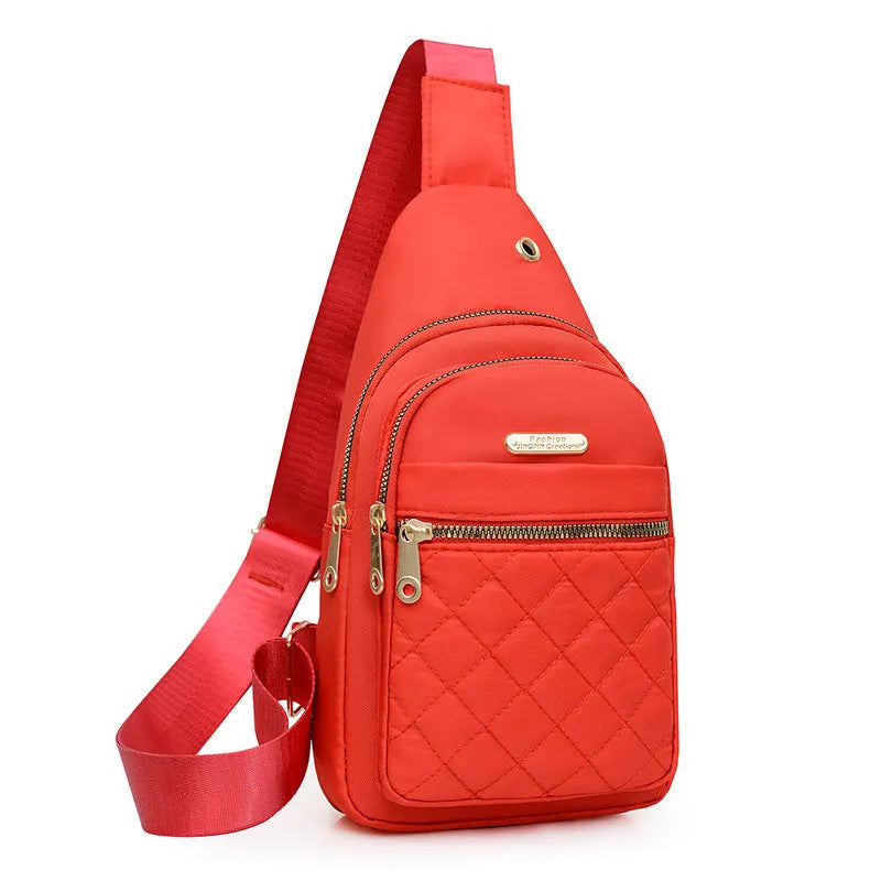 Girl's Oxford cloth crossbody chest bag in a solid colour with plaid detail