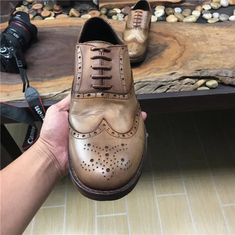Men's light brown vintage engraved handmade distressed leather shoes with lace-up closure and round toe