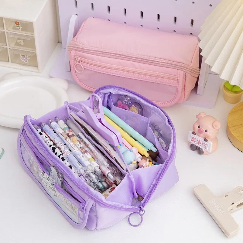 Ten-layer flip canvas pencil case in six colours showing open compartments with pens organised separately