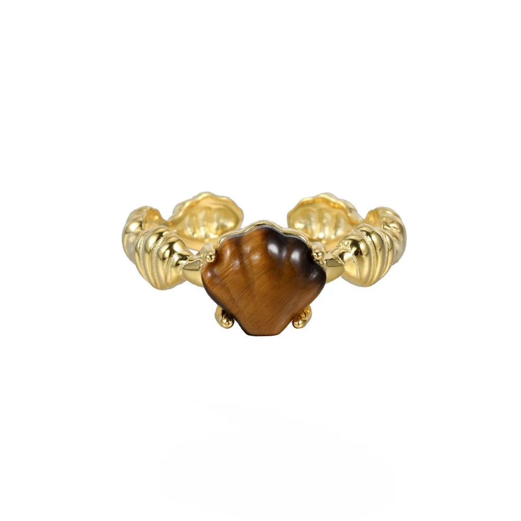 Adjustable silver ring with shell and tiger eye accents in gold electroplated finish showing opening mechanism