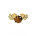 Adjustable silver ring with shell and tiger eye accents in gold electroplated finish showing opening mechanism