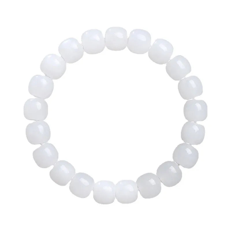 White jade barrel beads bracelet on wrist, showing Hetian jade beads in casual unisex design