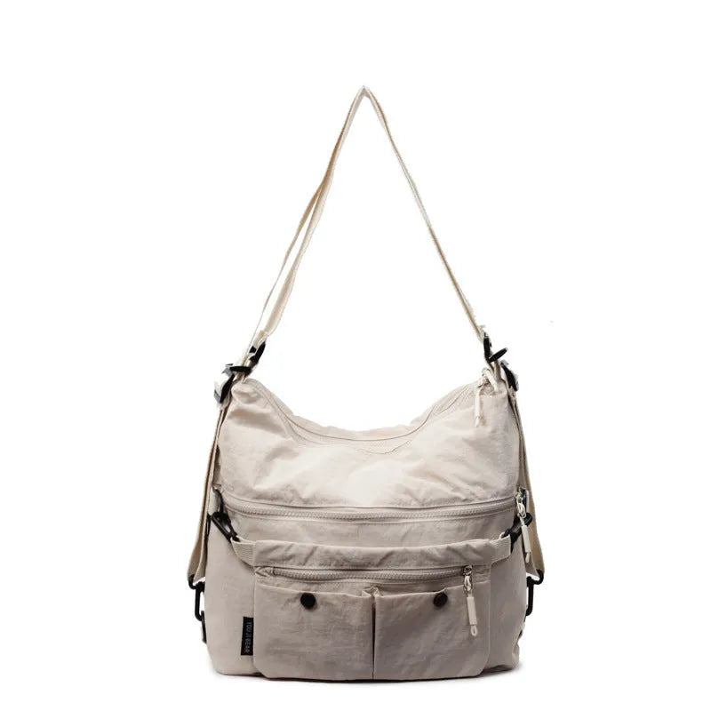 Women's soft nylon crossbody bag with sandwich zipper pocket and adjustable shoulder straps