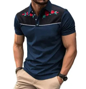 Man modelling a grey short sleeve mesh polo shirt with silver zipper decorations on the front.