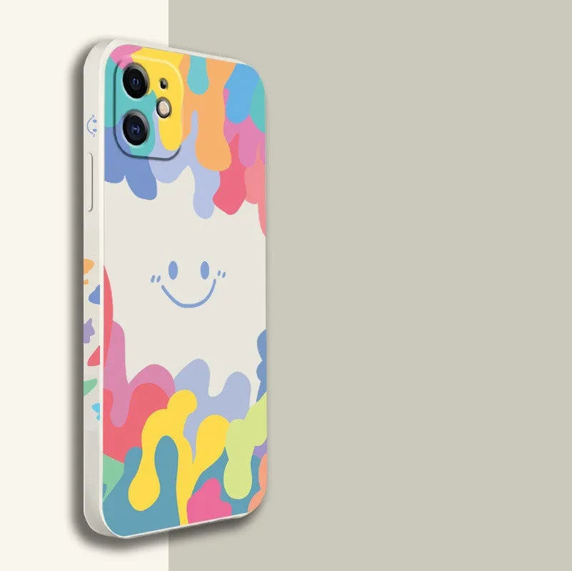 White TPU phone case with rainbow smiley face design and attached black lanyard for Apple iPhone.