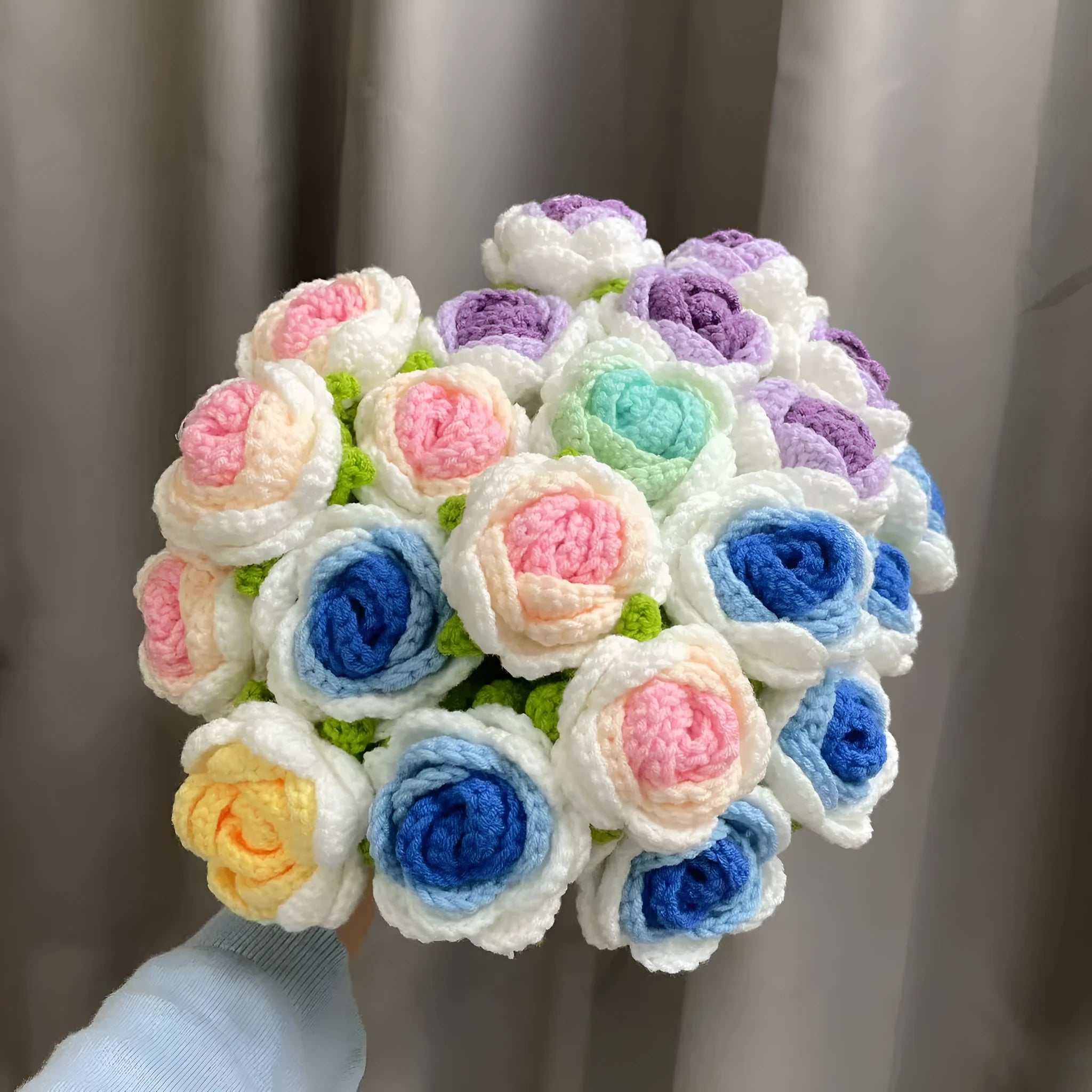 Artificial silk rose bouquet with blue gradient wool-weave petals on a single stem.