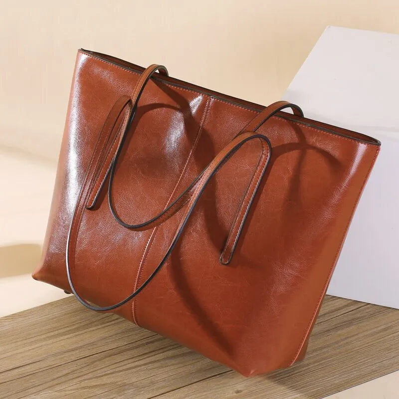Women's genuine cowhide leather shoulder bag with horizontal square design and multiple compartments