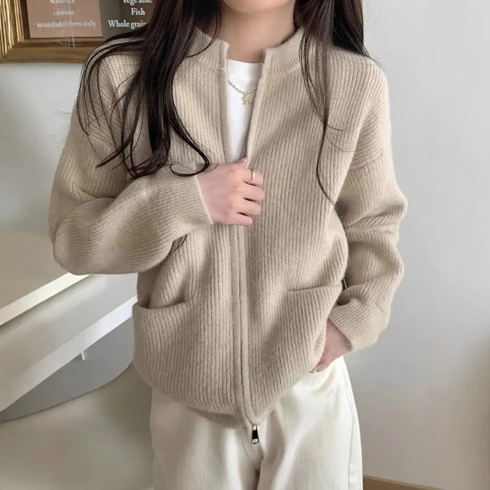 Beige viscose sweater coat cardigan with long sleeves showing soft texture and cardigan style
