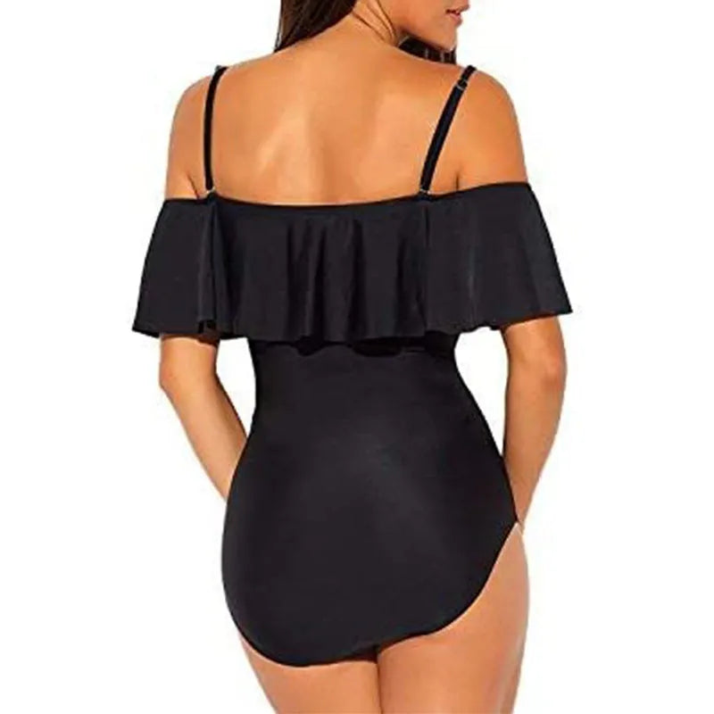 Black one-piece swimsuit with cut-out design and ruffled straps for swimming activities
