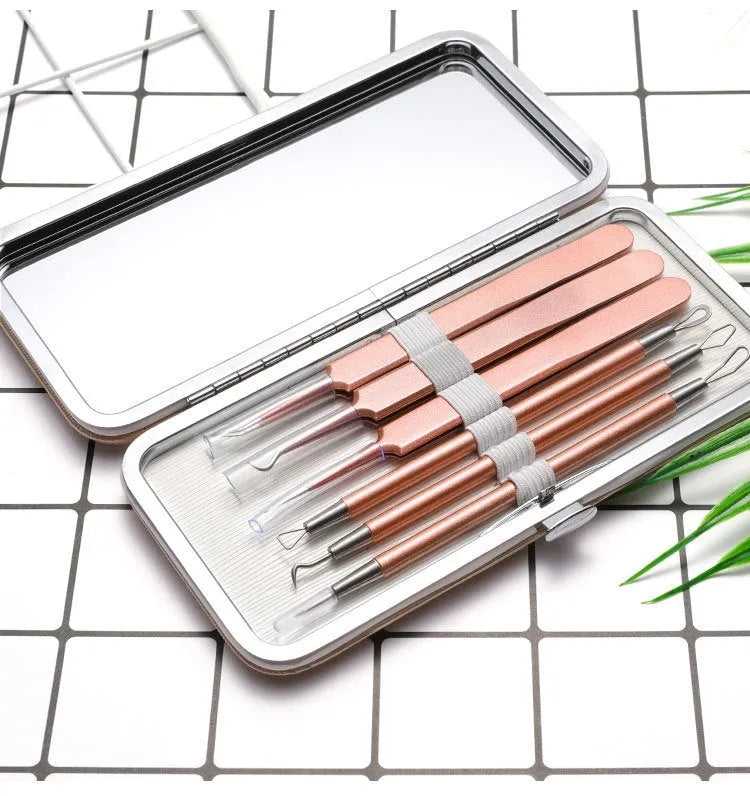 Six stainless steel acne remover tools with rose gold finish for pimple extraction