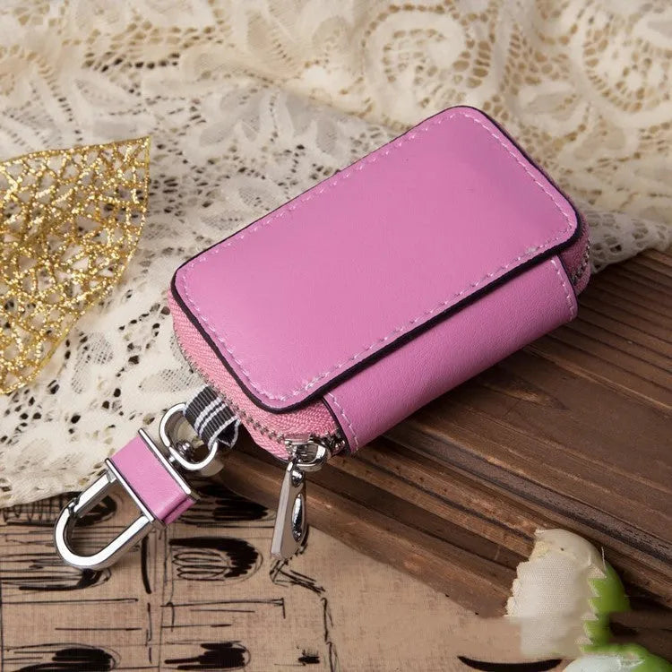 White genuine leather car key case with square vertical design and plain weave texture