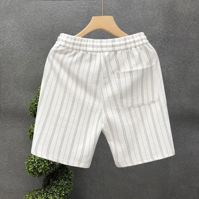 Men's black and white striped casual shorts with fleece lining, double-layer waistband, and ankle banding on straight-leg design