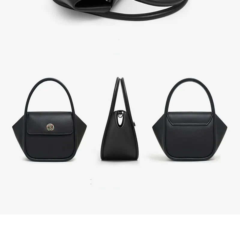 Leather tote cross-body wing bag in soft cow leather with latch closure and wing shape design.