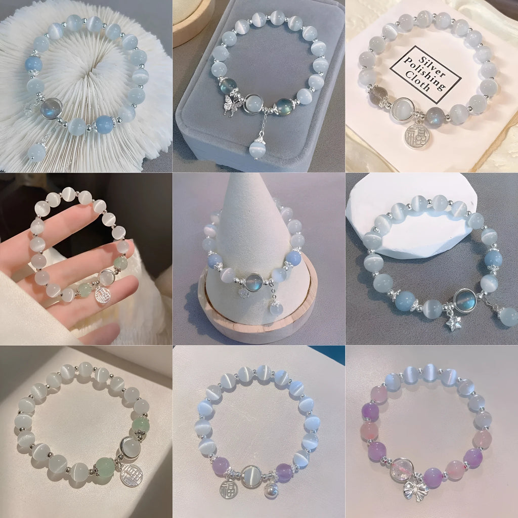 Glass butterfly bracelet for women with drop shape design and round decorative elements in moonlight grey colour