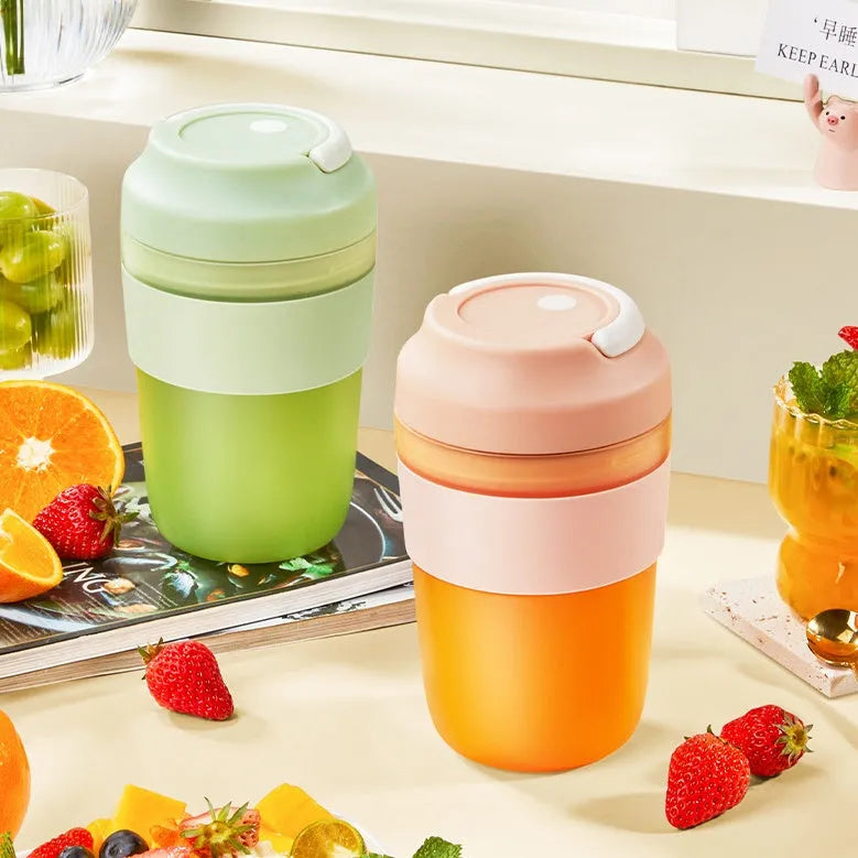 Portable blender juicer cup in green colour with 400ml capacity and stainless steel blades