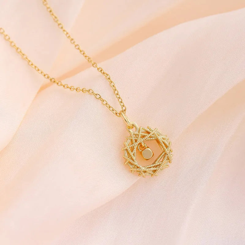 Gold circle net design necklace for women with titanium steel O chain and geometric electroplated pendant.