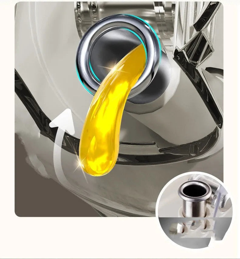Warm grey glass 2-in-1 oil sprayer and pourer bottle with switchable cap on kitchen counter