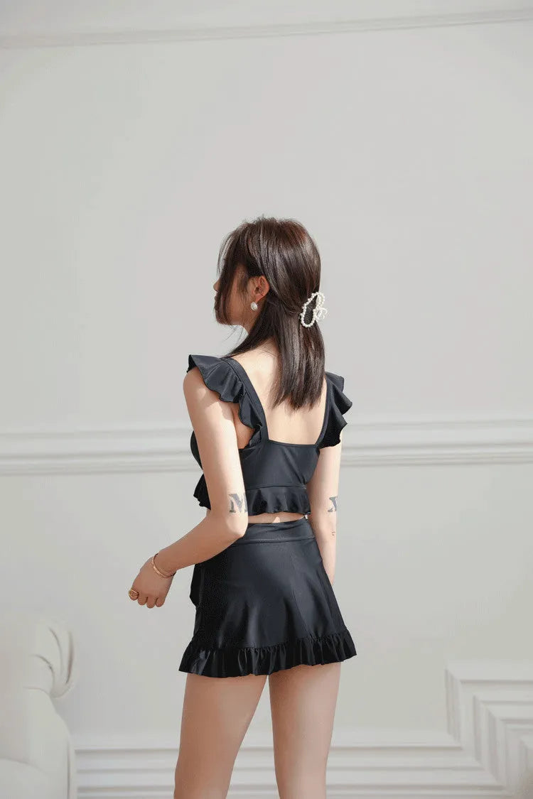Black nylon swimsuit for women with split brief design