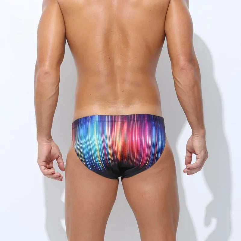 Men's printed swimming trunks in polyester showing cyber, ice cream, streamer, and skull pattern options.