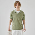 Men's solid colour knitted polo T-shirt in acrylic fabric for summer, shown on a hanger.