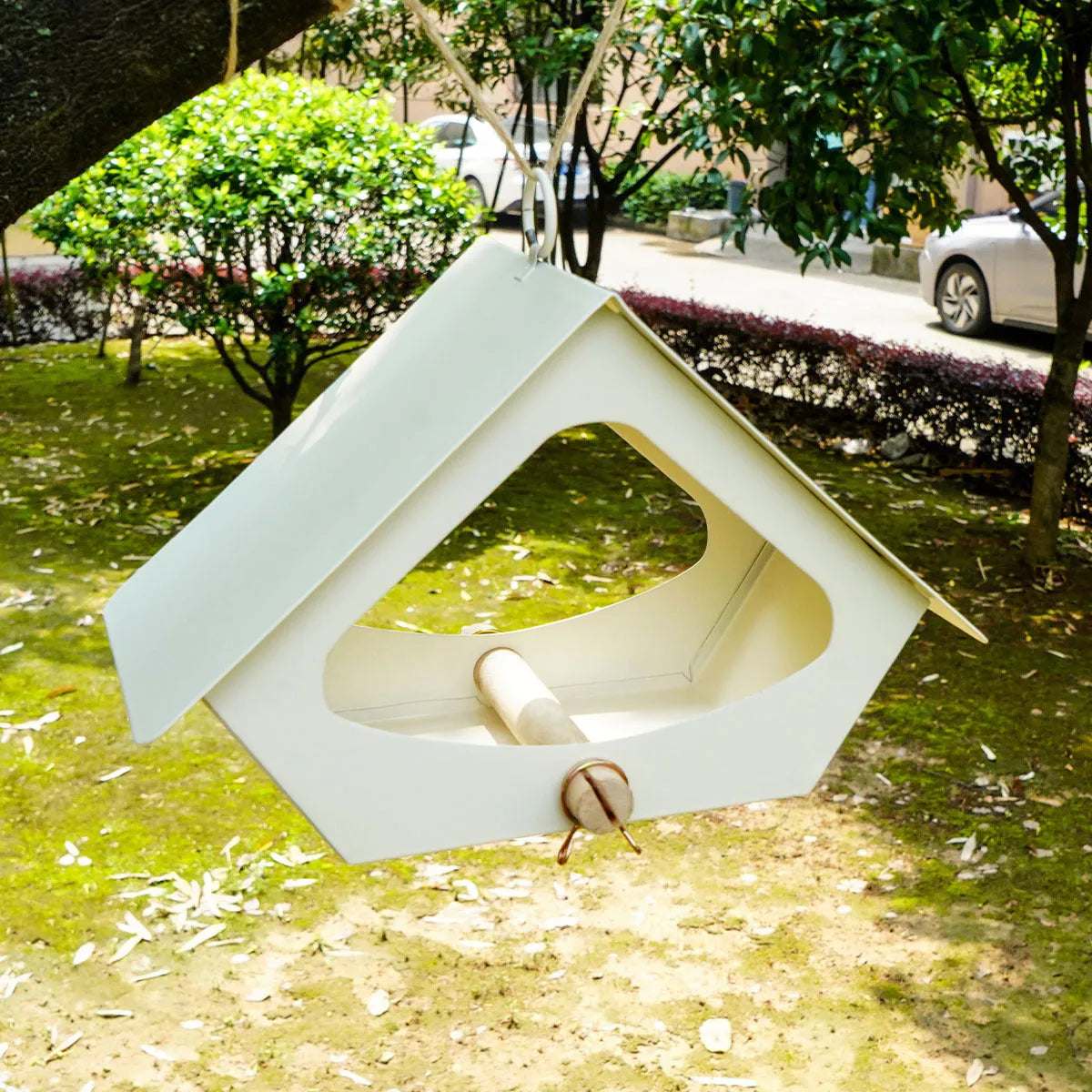 European-style modern iron bird house with anti-rain shelter in garden setting