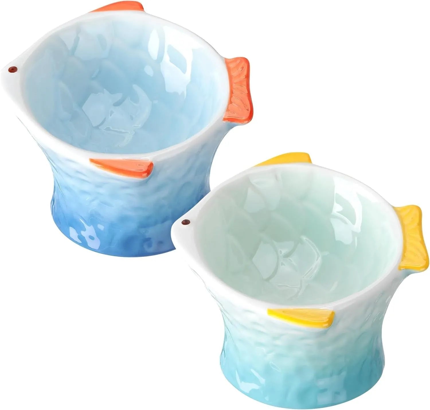 Blue fish-shaped ceramic cat bowl with 15-degree tilt angle on wooden surface