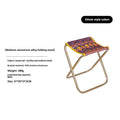 Black aluminium alloy folding stool with ethnic pattern, folded for compact storage