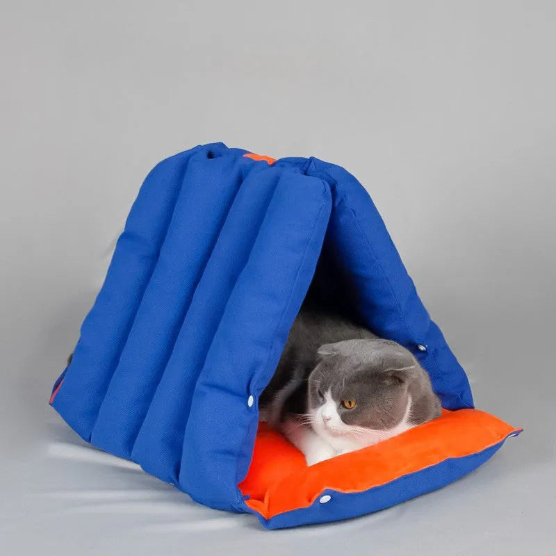 Blue triangular sofa-style cat nest with connectable sides and removable cotton cover