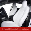 Black and white PVC car seat covers fitted on Tesla Model 3 and Y front and rear seats.