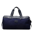 Large black Oxford cloth messenger bag showing its size and style.